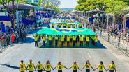 Nas arquibancadas montadas na Esplanada, o público recebeu dos organizadores do desfile um boné escrito "Brasil Soberano". - Ricardo Stuckert / PR