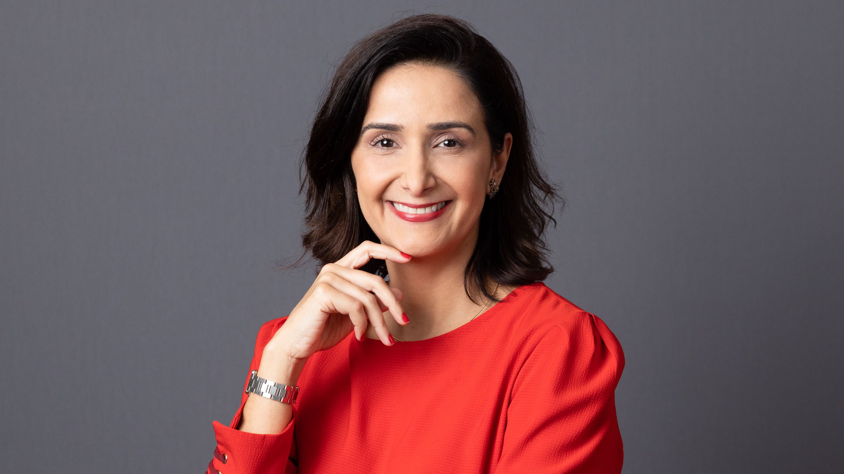 Tatiana Villani, tributarista, mulher, branca, cabelos longs