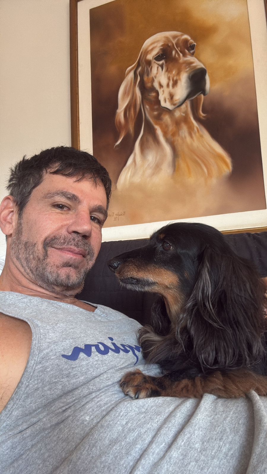 retrato do educador físico Marcio Atalla com seu cachorro