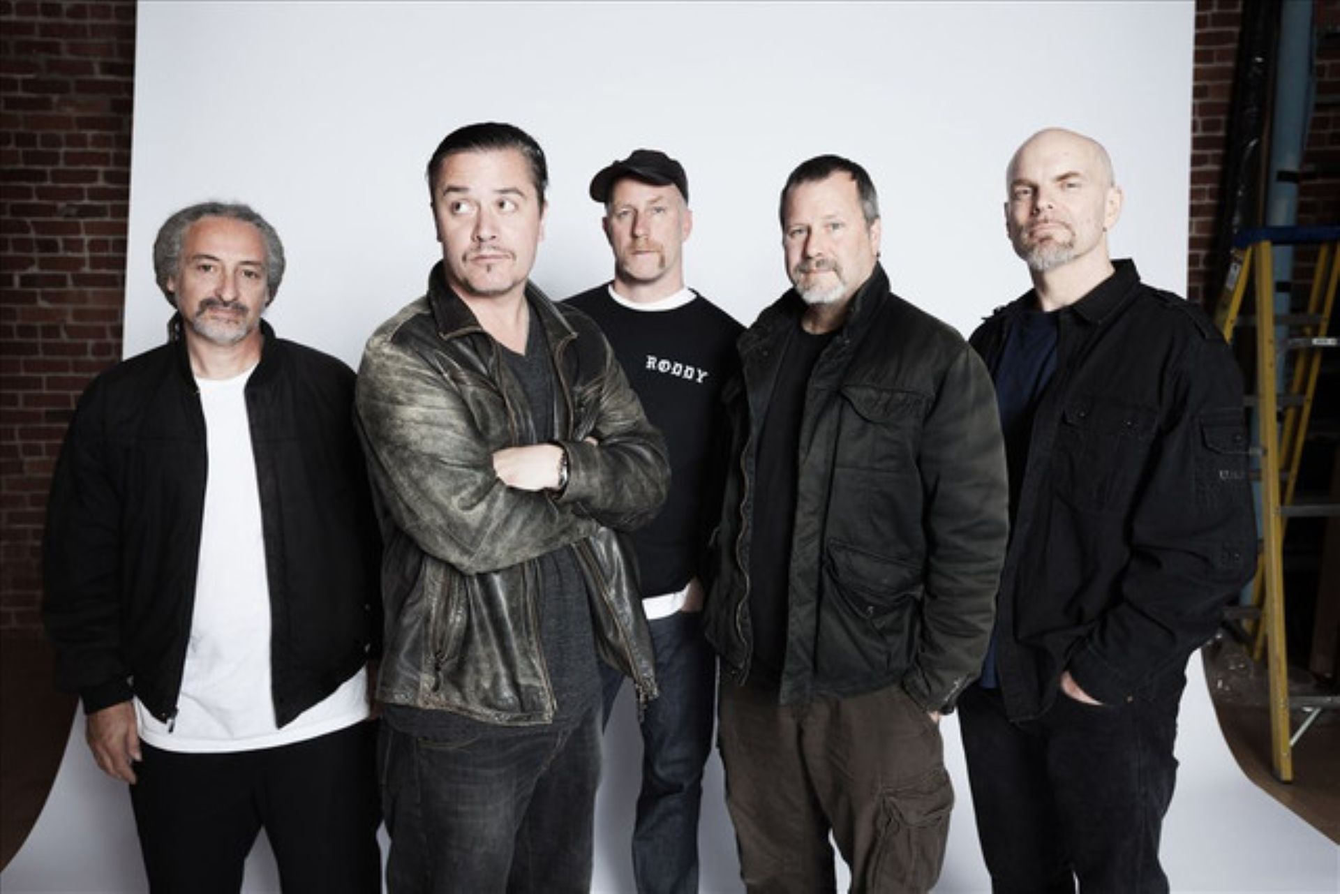 Os integrantes do Faith No More reunidos na foto