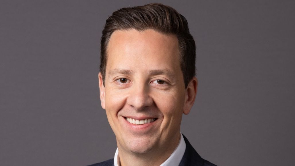 Henrique Melo, executivo, homem, branco, cabelos castanhos e curtos